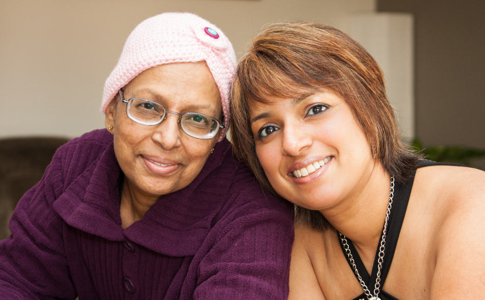 two women smiling together